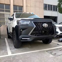 Бампер стиль TRD Hilux 2021+
