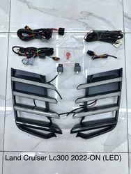 Вставки в бампер ходовыми огнями LC300