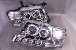 Фары линзовые pajero 99-06 с drl и ангельскими глазками
