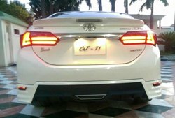 Фонари на corolla 2013 дизайн bmw (красные и красно-тонированные)
