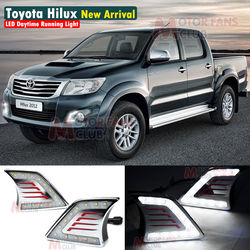 Дневные ходовые огни в штатное место Hilux и Vigo 12-14