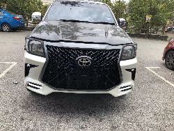 Бампер с решеткой Hiluх 2011- стиль TRD Superior