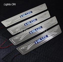 Накладки на пороги с подсветкой Hilux 07-12